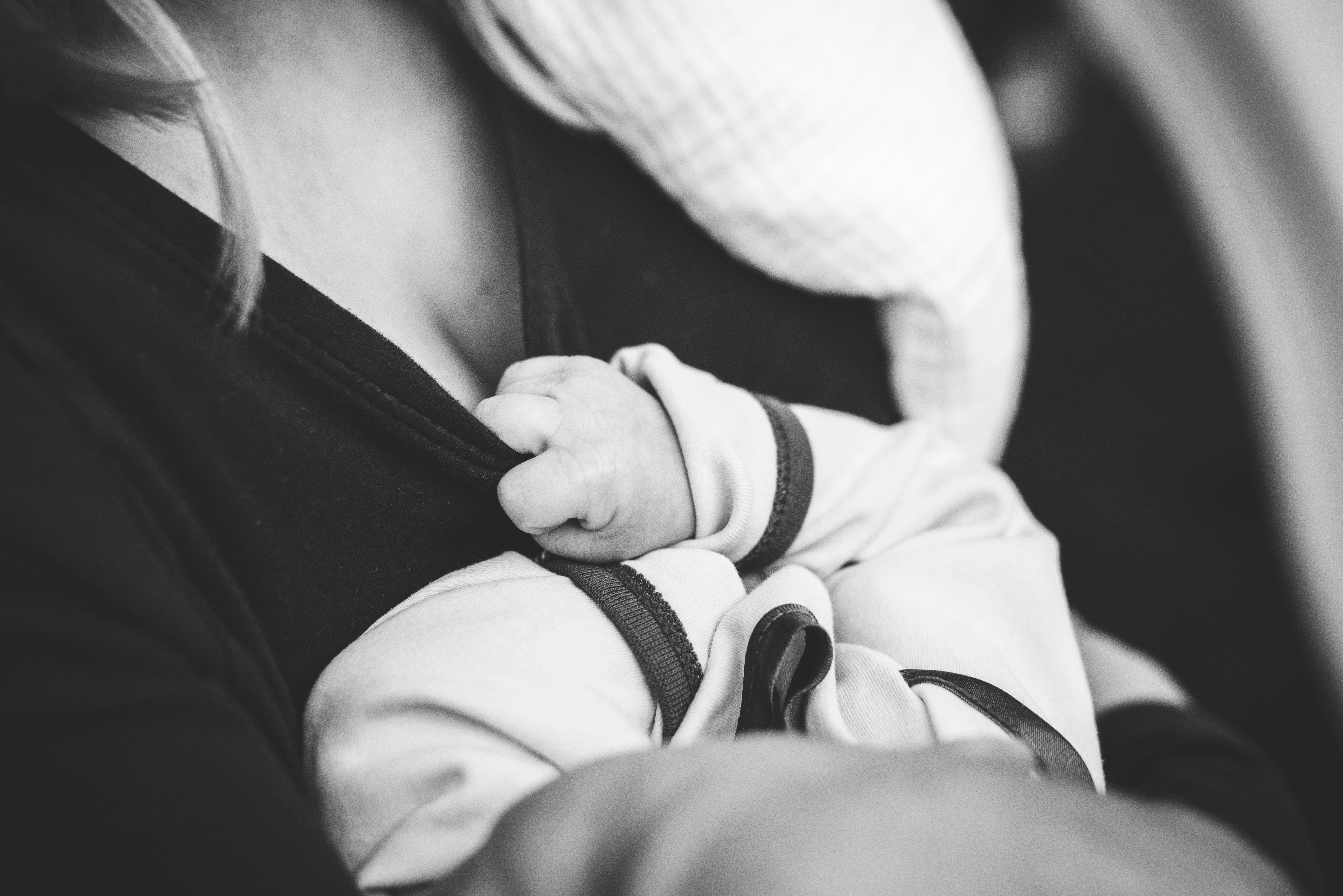 parent holding baby